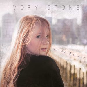 Album Cover of In My Dreams, Ivory looks behind over a shoulder into the camera with hair across her face.